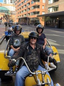 A family trike tour experience. Two trikes took a family of four around parts of Sydney Australia.
